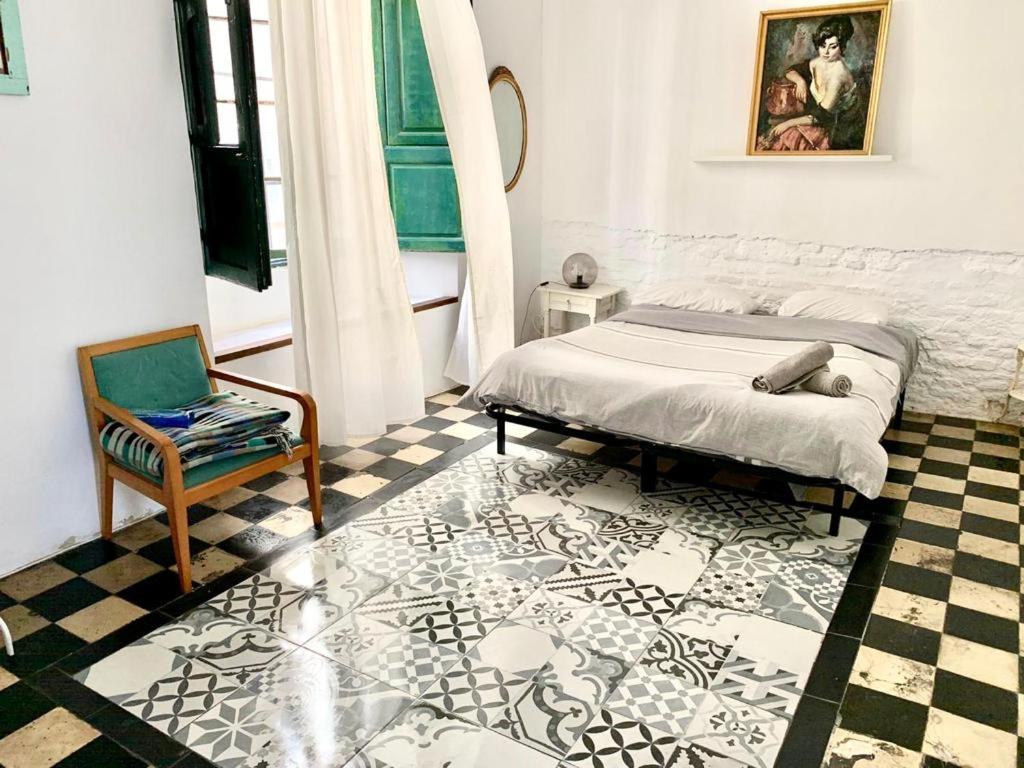 A bed or beds in a room at Maria Magdalena - Room 1