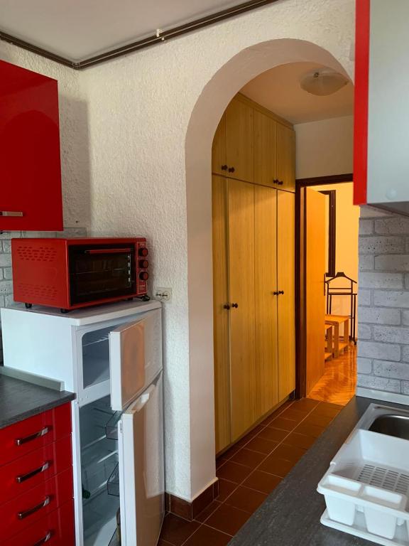 Kuchyň nebo kuchyňský kout v ubytování Villa Gromaca
