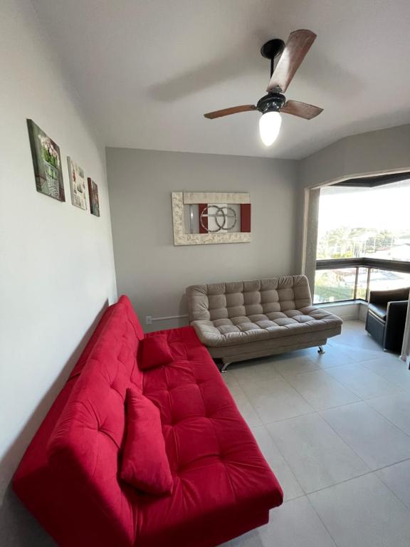 Гостиная зона в Apartamento Florianópolis ponta das canas