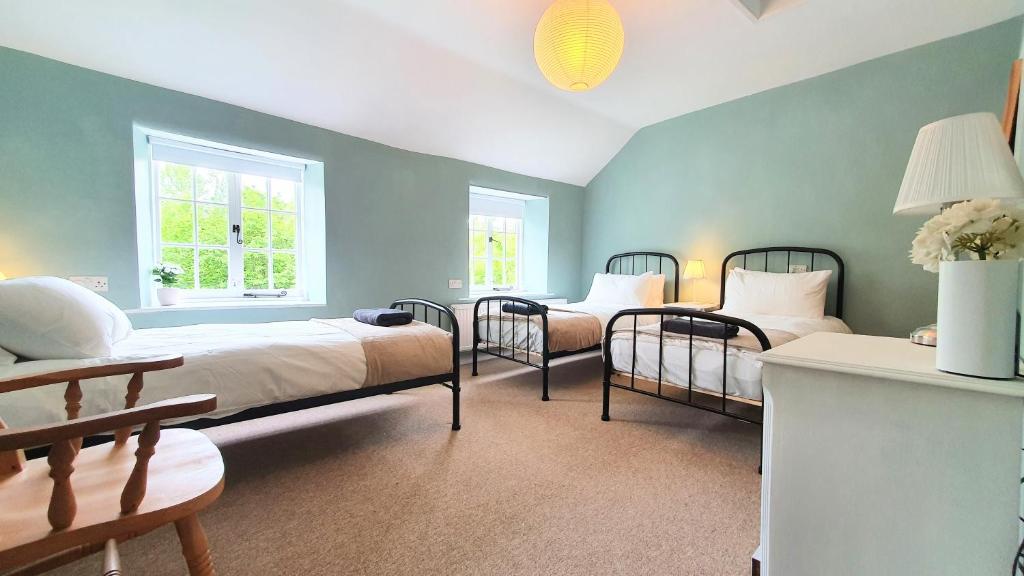Postel nebo postele na pokoji v ubytování Glenfield Cottage - Secluded Luxury deep in the Oxfordshire Countryside