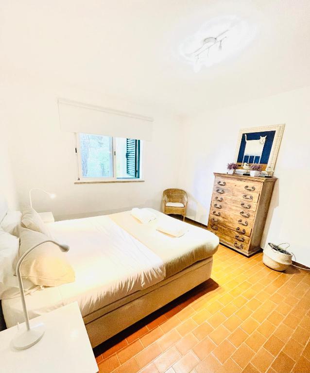 Postel nebo postele na pokoji v ubytování GOLF & BEACH VILLA