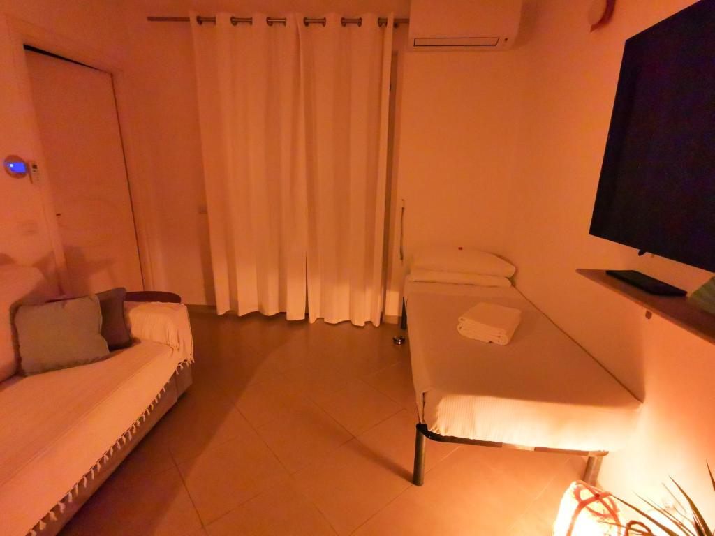 Posteľ alebo postele v izbe v ubytovaní Vicky's homestay Sanremo - C. CITRA 008055-LT-1257