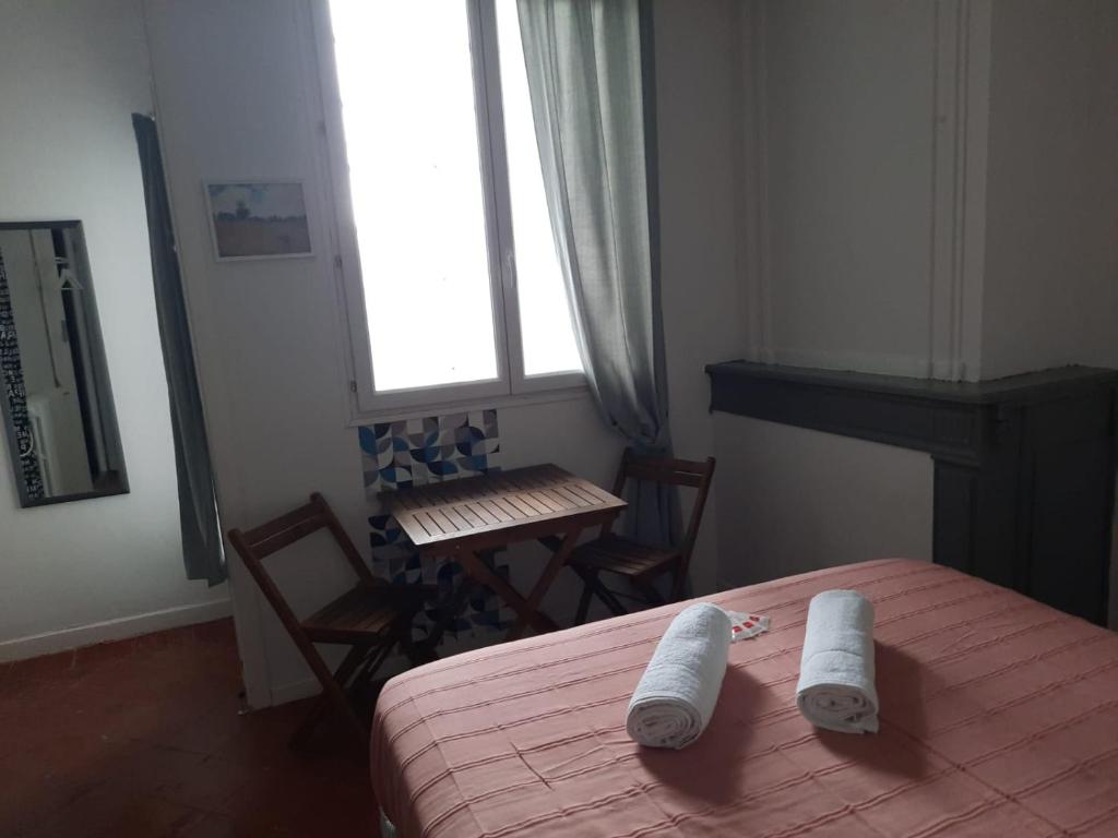 Postel nebo postele na pokoji v ubytování etape gimontoise 32 "Chambre tout confort"