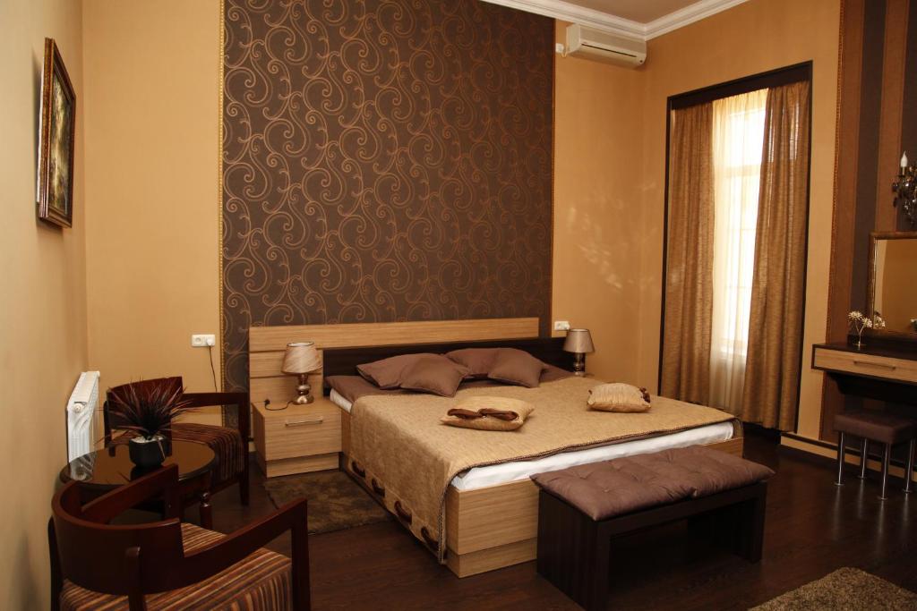 Postel nebo postele na pokoji v ubytování Azoyan Guest House