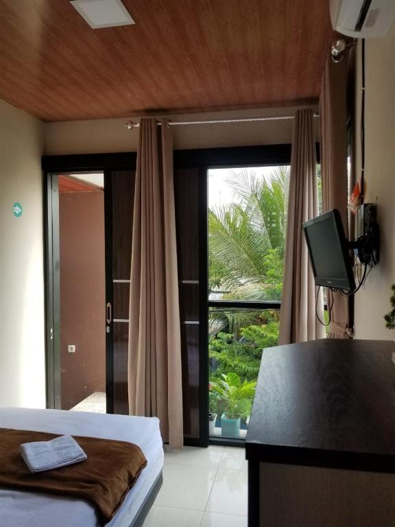 EDUTAMA Homestay Syariah - Habitación Queen