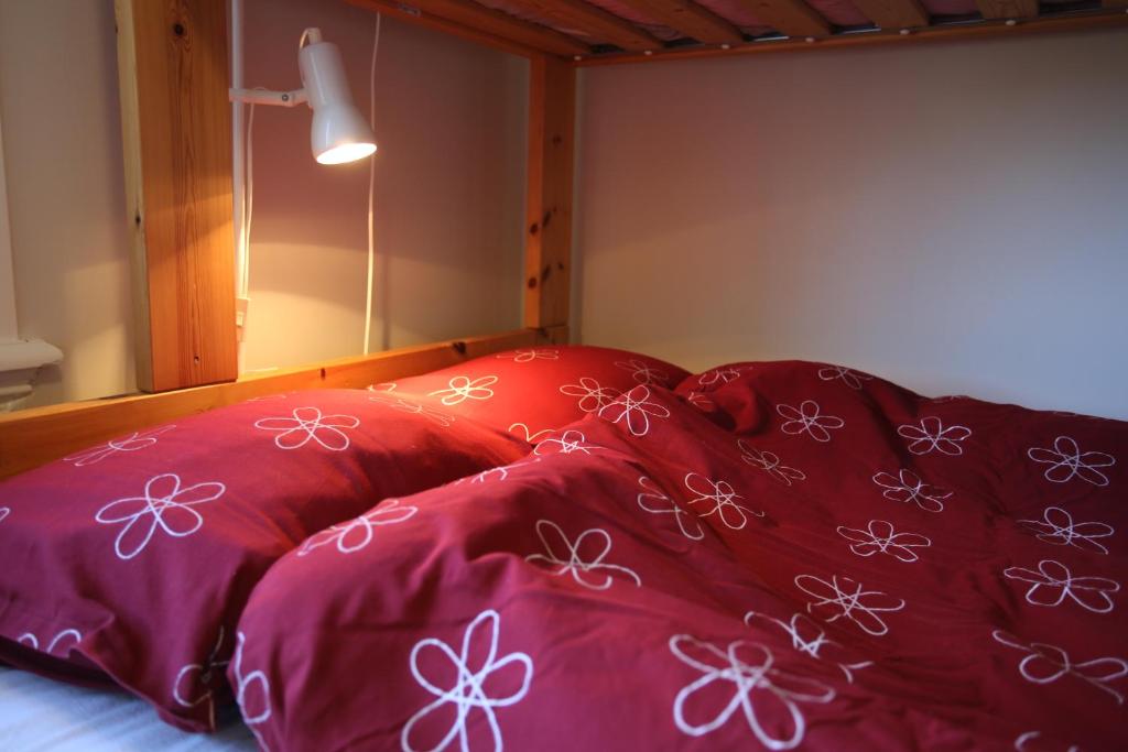 Postel nebo postele na pokoji v ubytování Semesterhemmet Sommarro