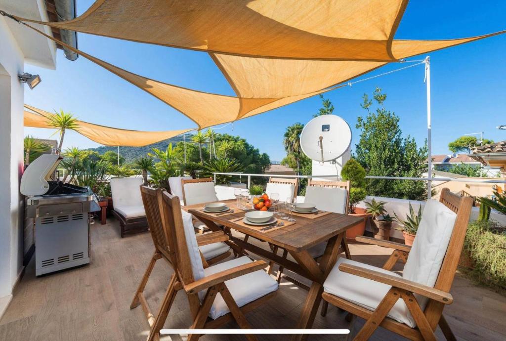 A balcony or terrace at BEACH INN Apartment
