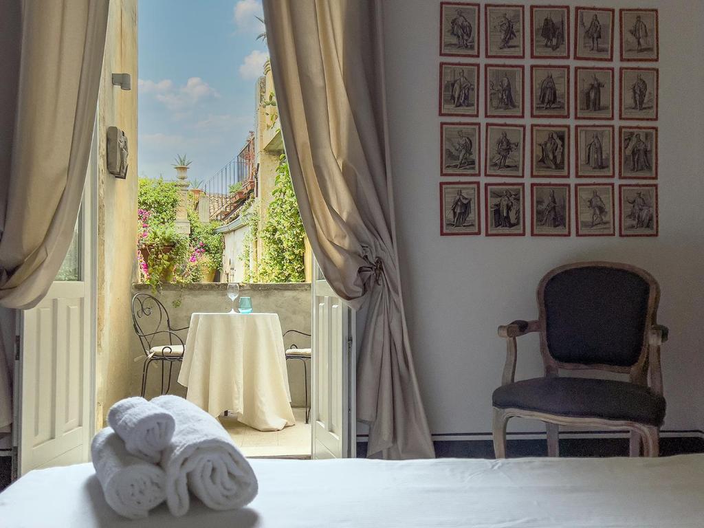 Postel nebo postele na pokoji v ubytování Casa Modica - Luxury rooms