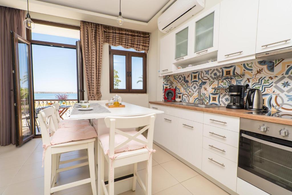 Kuchyň nebo kuchyňský kout v ubytování Blue Sea Relax Apartment