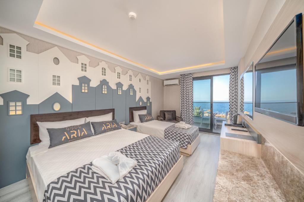 Postel nebo postele na pokoji v ubytování ARIA RESORT & SPA HOTEL Ultra All Inclusive