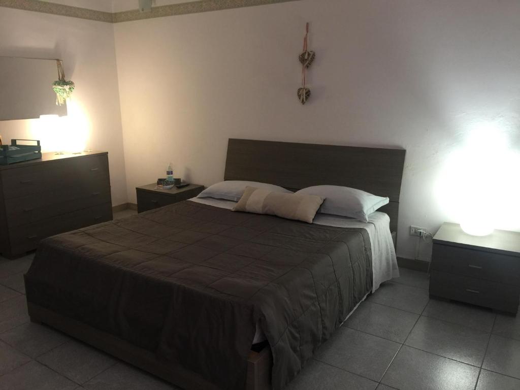 Postel nebo postele na pokoji v ubytování B&B Il Tulipano