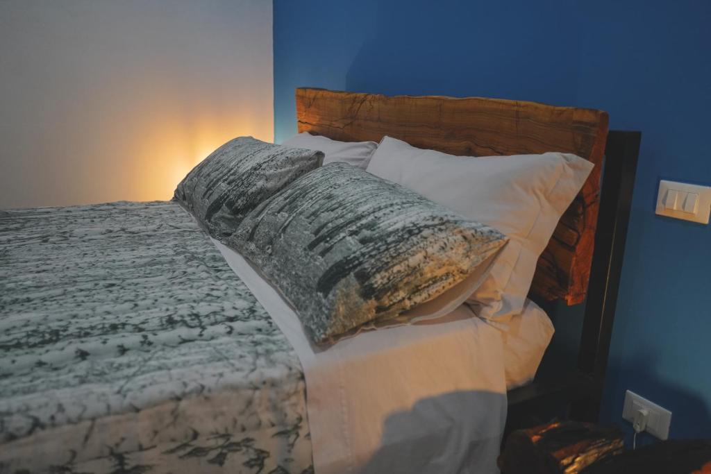 Postel nebo postele na pokoji v ubytování Ulivo Design b&b