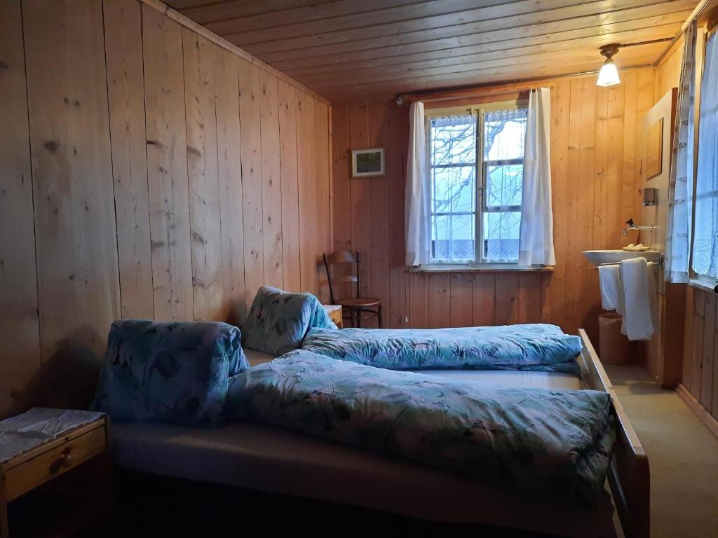 Postel nebo postele na pokoji v ubytování Berggasthaus Obbort