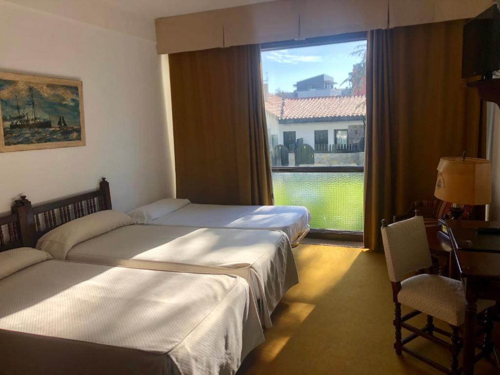 Cama o camas de una habitación en El Ancla