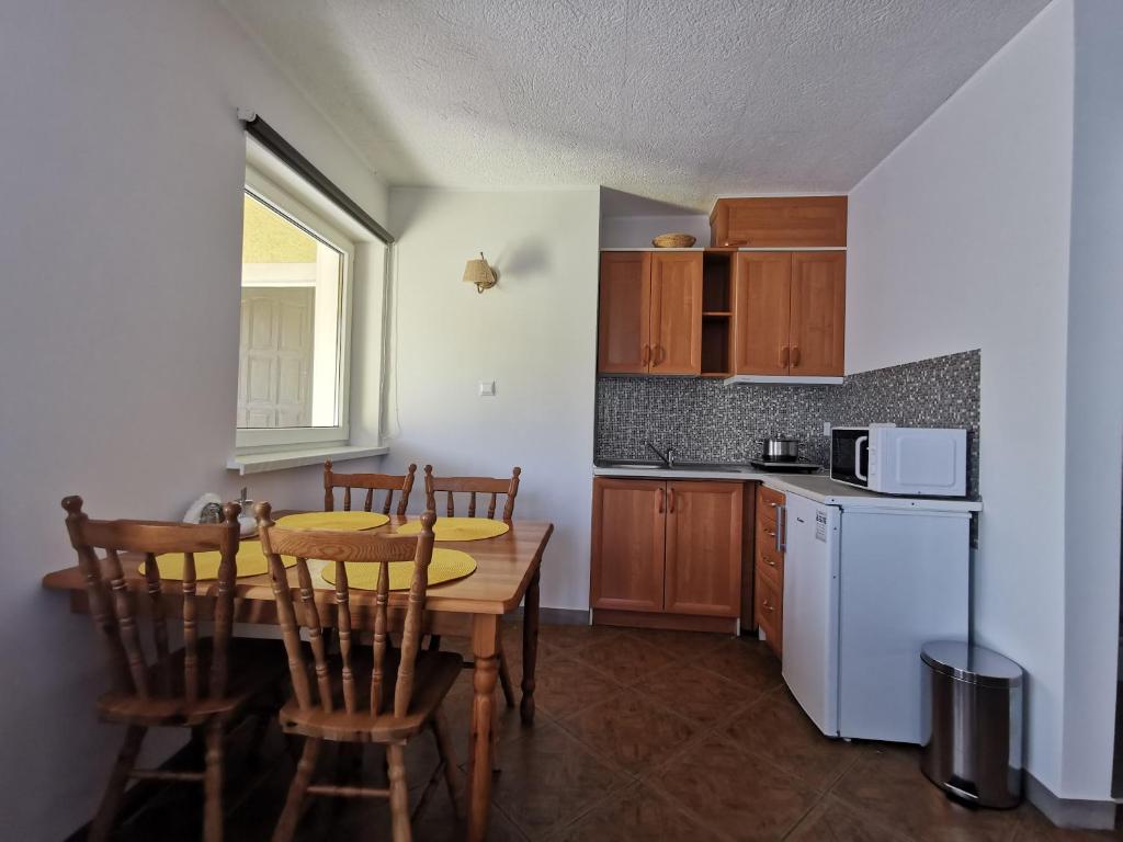 Kuchyňa alebo kuchynka v ubytovaní Apartament Ogrodowa
