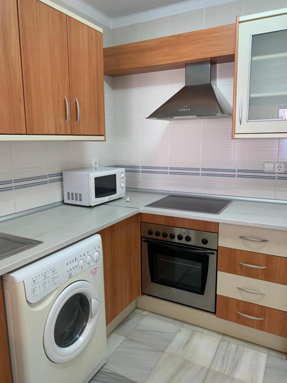 Kuchyňa alebo kuchynka v ubytovaní Apartamentos El Minarete