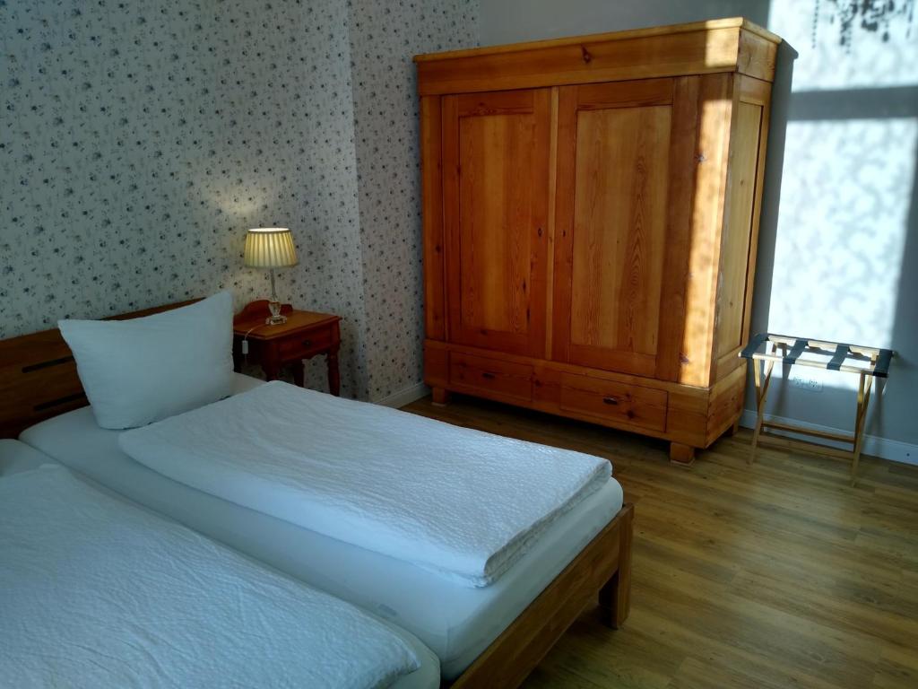 Postel nebo postele na pokoji v ubytování Altstadtpension Hameln