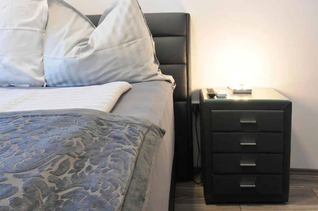 Posteľ alebo postele v izbe v ubytovaní Silver Beach Apartments