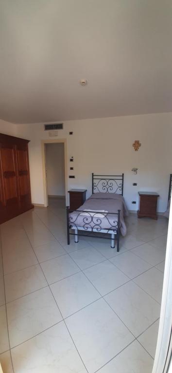 Postel nebo postele na pokoji v ubytování Casa per ferie religiosa Figlie di Nazareth