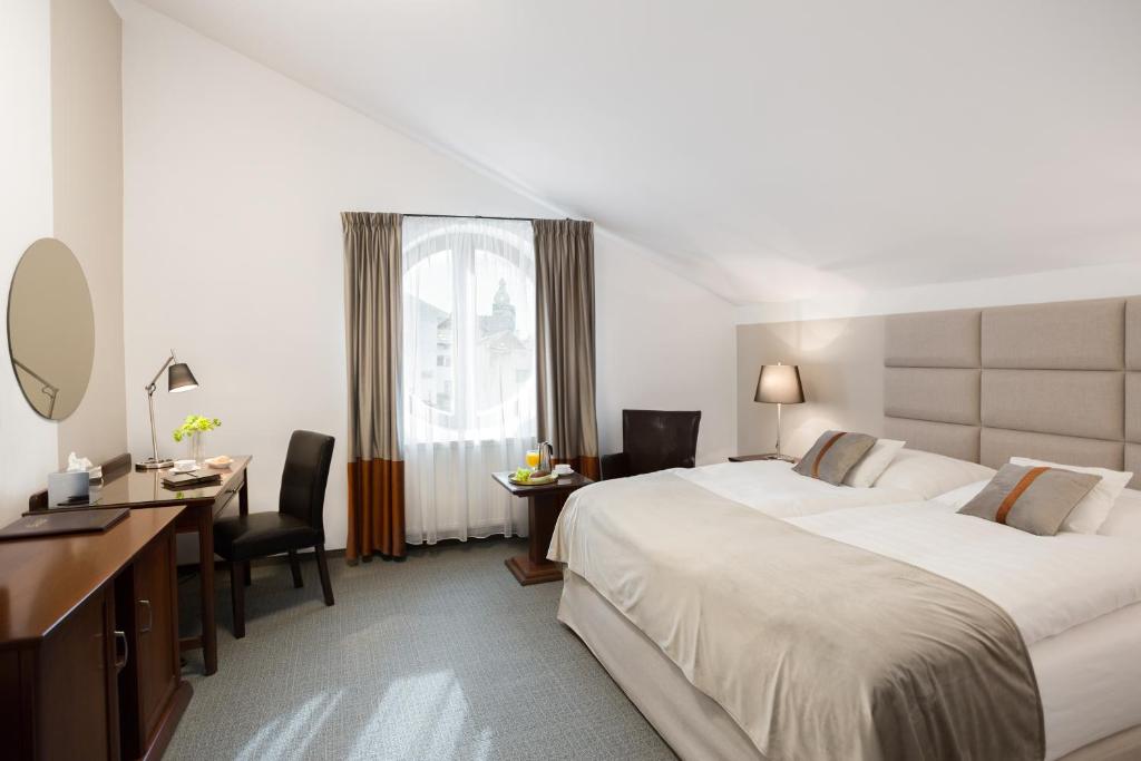 Postel nebo postele na pokoji v ubytování Boutique Hotel Bristol