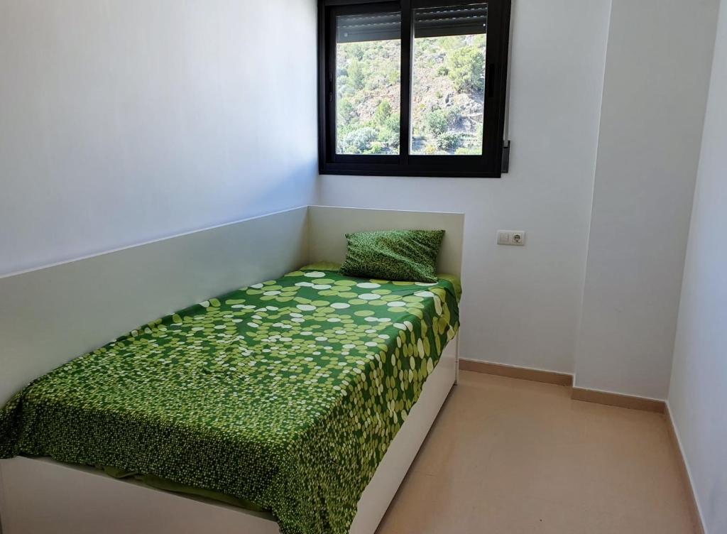Postel nebo postele na pokoji v ubytování Velez Nazari Lugar 20