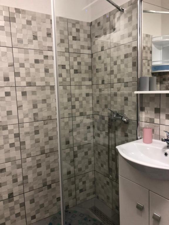 Kúpeľňa v ubytovaní Apartmani Roxy