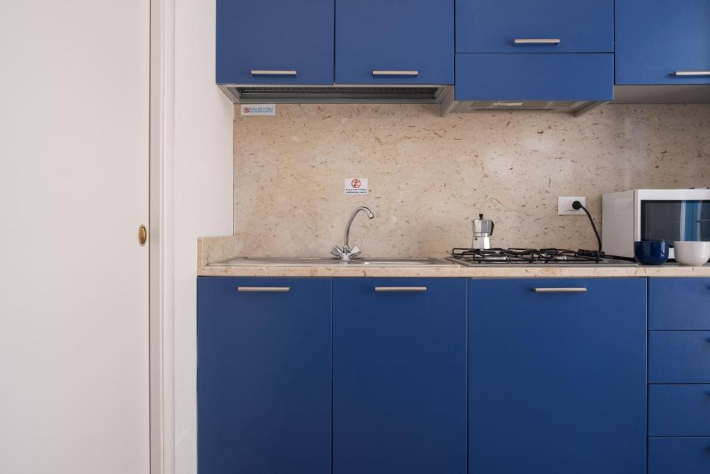Kuchyň nebo kuchyňský kout v ubytování Orsola Apartments