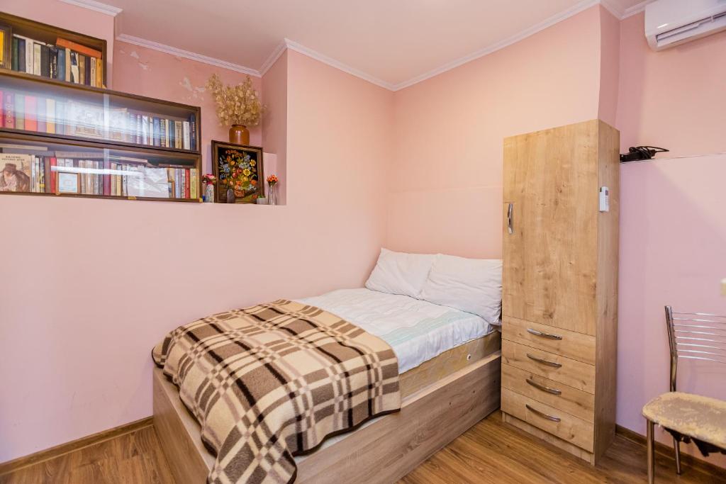 Postel nebo postele na pokoji v ubytování Anzori House