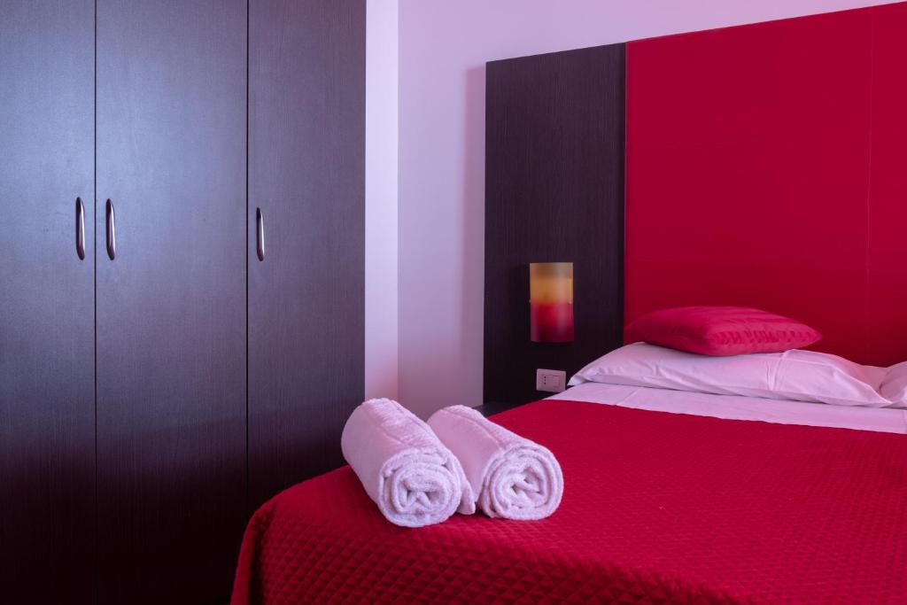 Postel nebo postele na pokoji v ubytování Orsola Apartments