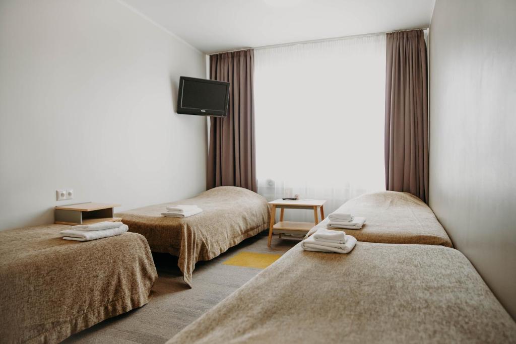Postel nebo postele na pokoji v ubytování Hostel Tartu