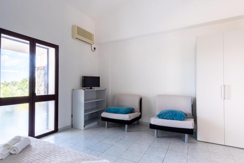 Telewizja i/lub zestaw kina domowego w obiekcie Residence Cort'e Accas