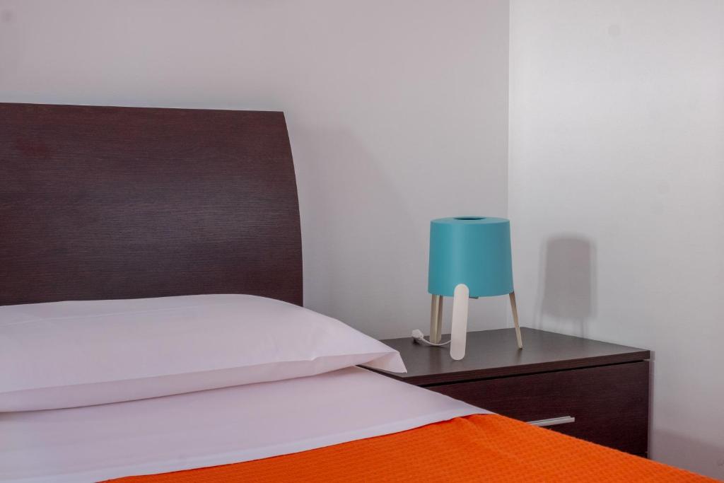 Postel nebo postele na pokoji v ubytování Orsola Apartments