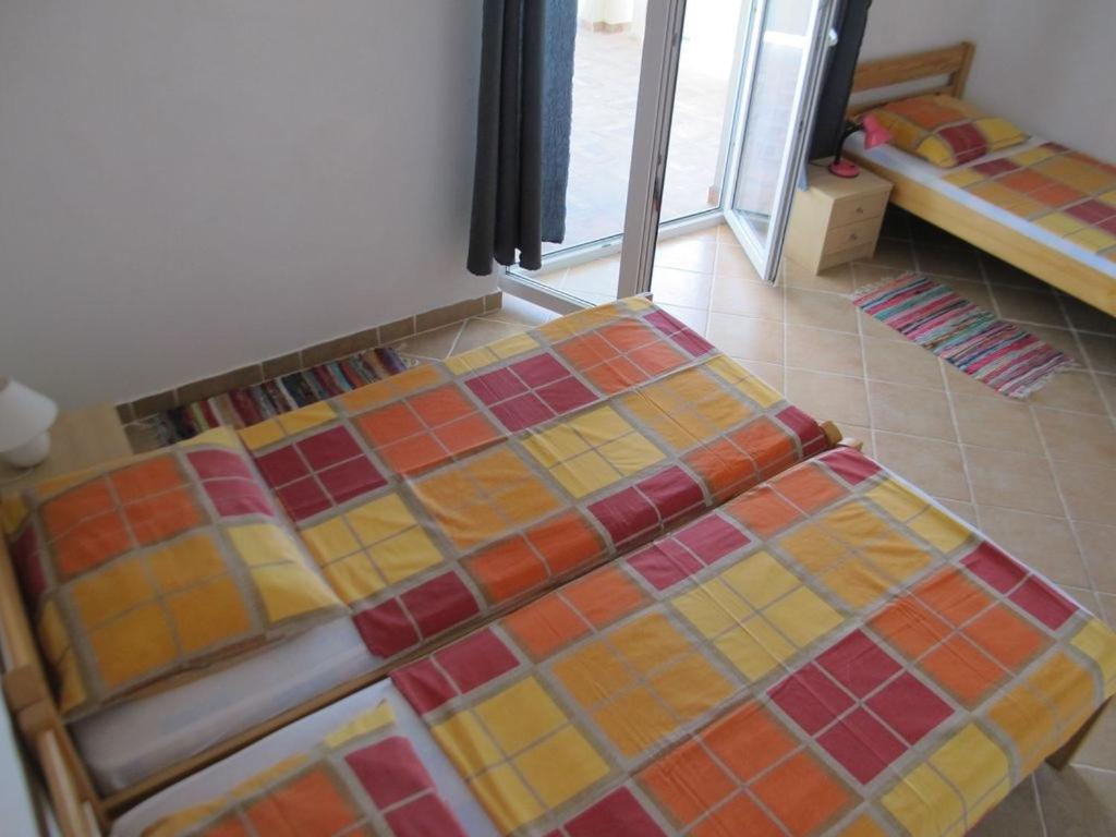 Posteľ alebo postele v izbe v ubytovaní Apartment in Vir with sea view, terrace, air conditioning, WiFi 4472-1