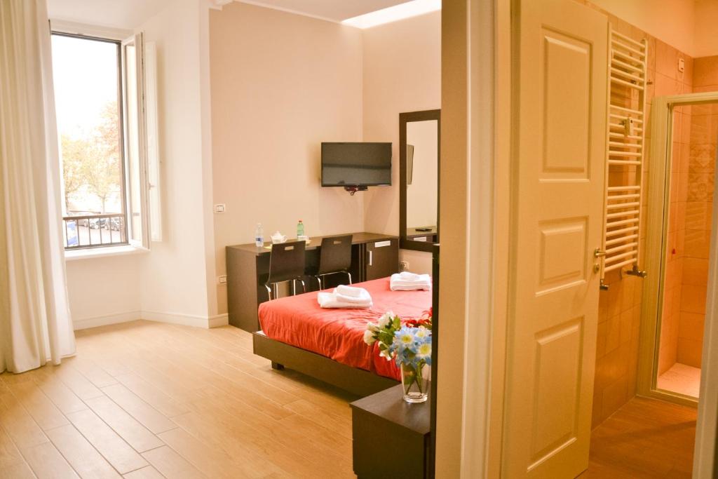A bed or beds in a room at TheWesley