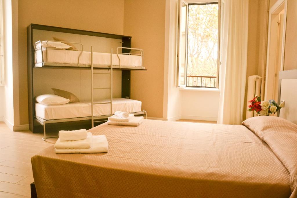 A bed or beds in a room at TheWesley