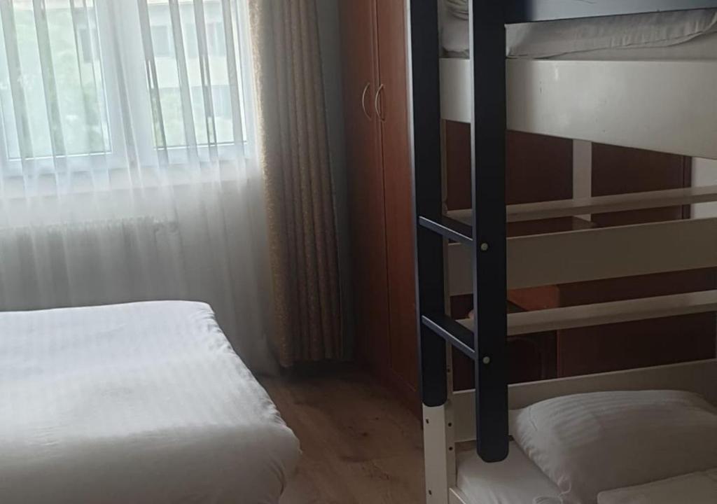 Postel nebo postele na pokoji v ubytování Hotel Du Quai