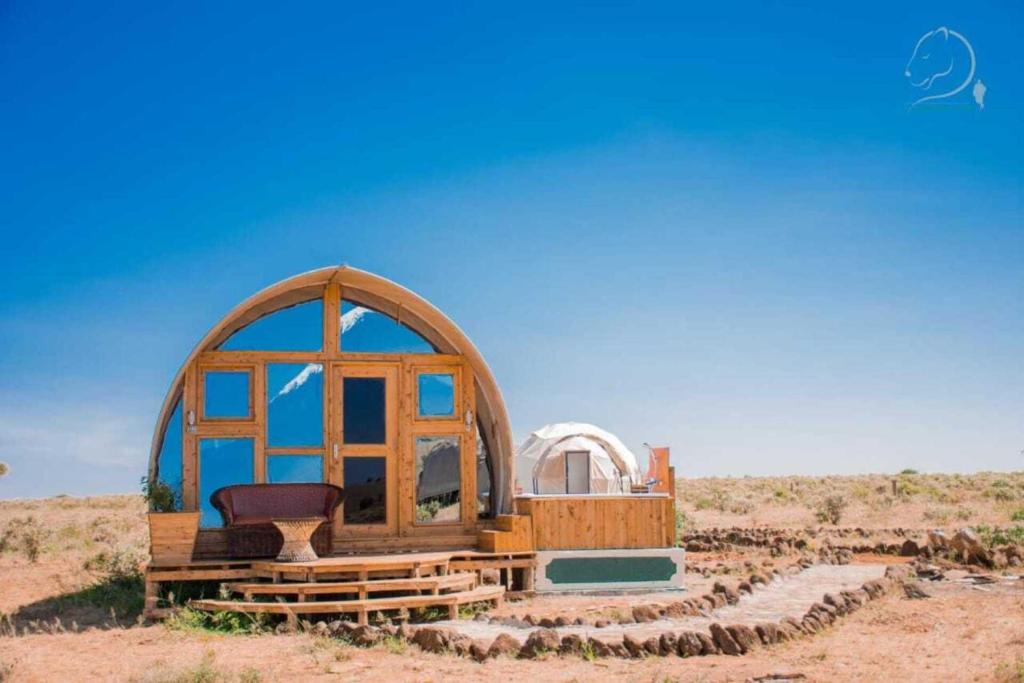 a small gazebo in the middle of the desert at Amanya King Lion 1-Bed Wigwam in Amboseli in Amboseli