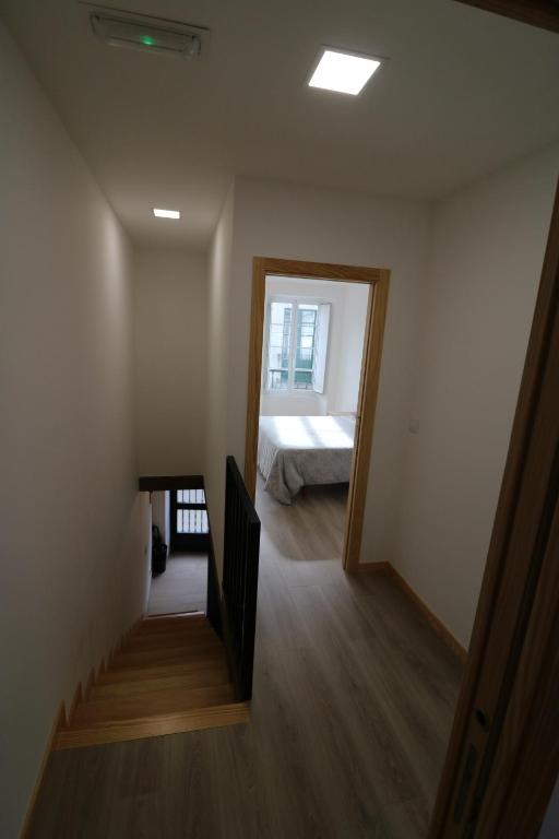 Postel nebo postele na pokoji v ubytování Buen Camino Melide