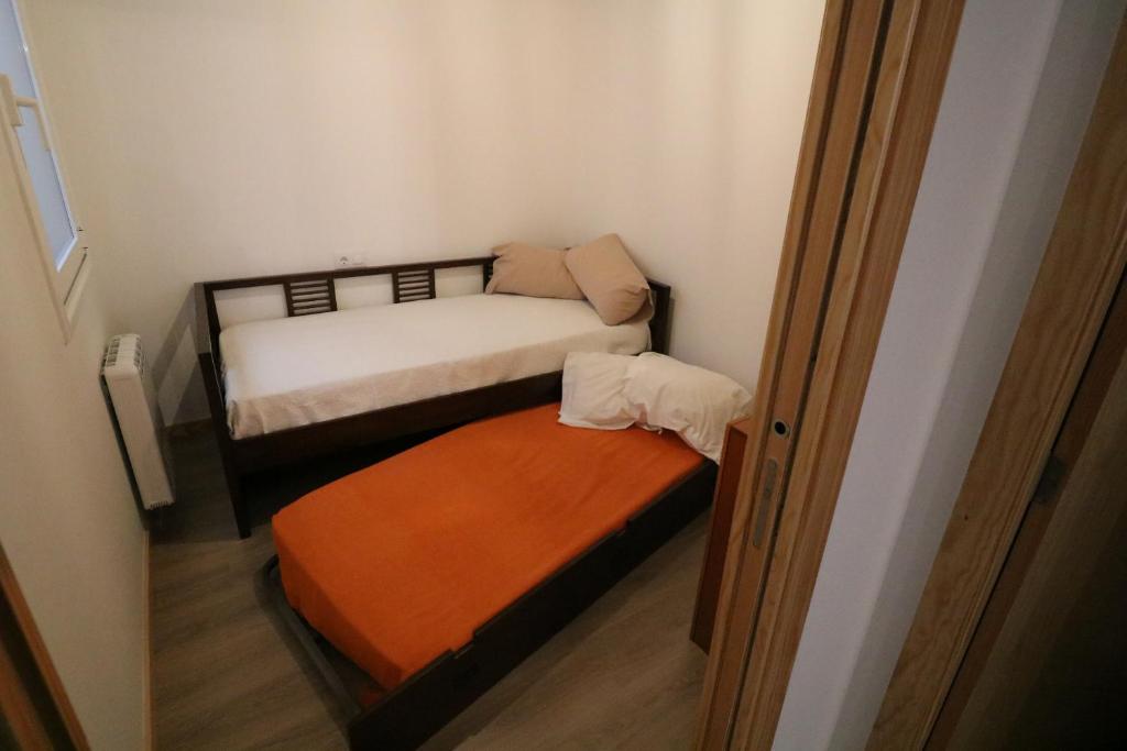 Postel nebo postele na pokoji v ubytování Buen Camino Melide