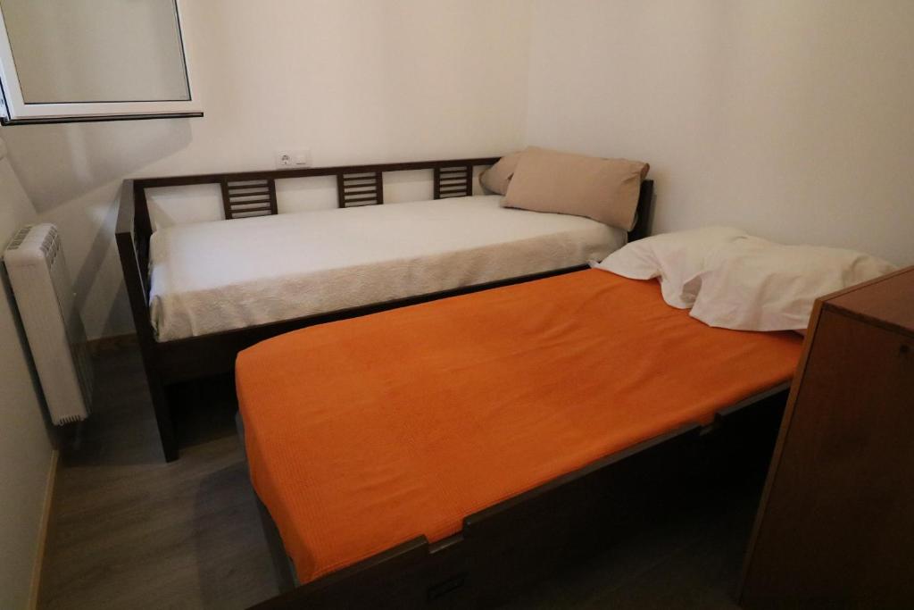 Postel nebo postele na pokoji v ubytování Buen Camino Melide