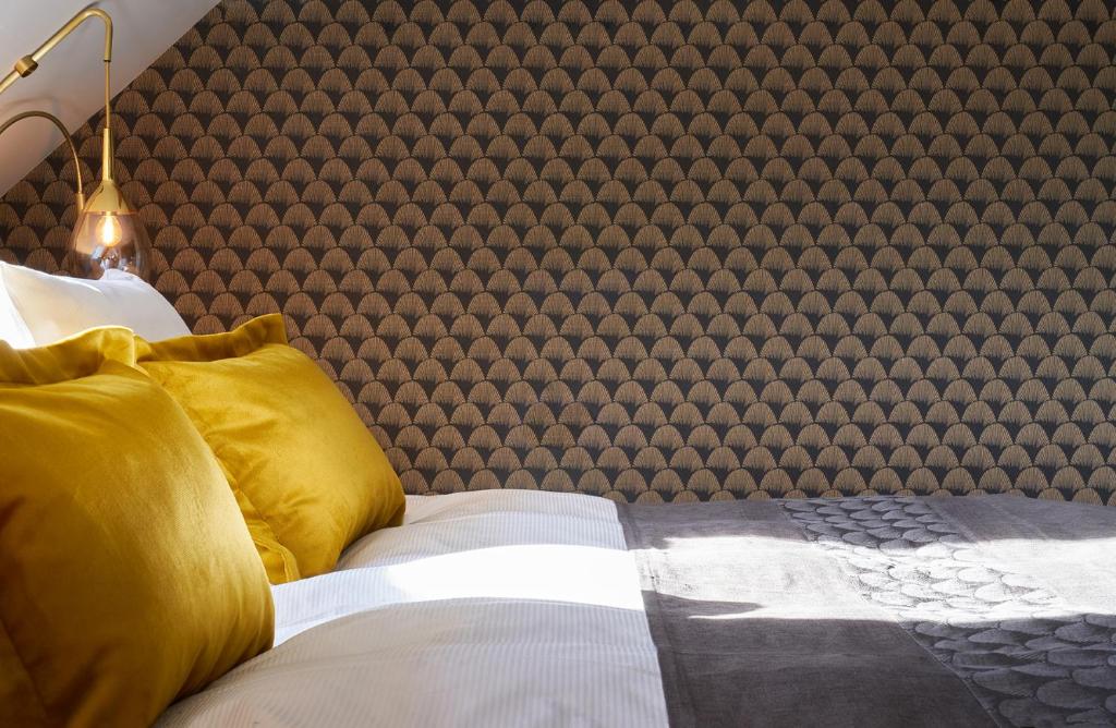 Postel nebo postele na pokoji v ubytování Boutique Hotel Seefeld