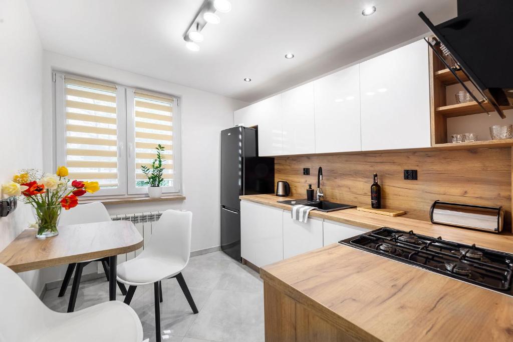Kuchyňa alebo kuchynka v ubytovaní Apartament Łąkowa 2