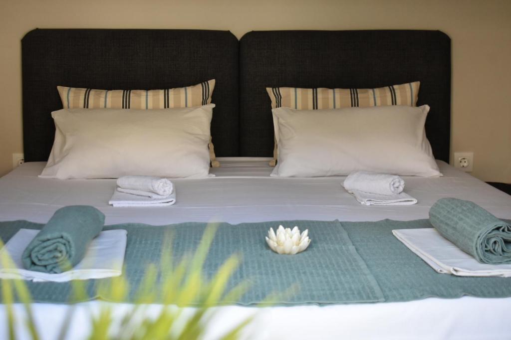 Postel nebo postele na pokoji v ubytování Davidana Deluxe Apartments