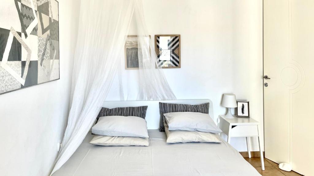 Posteľ alebo postele v izbe v ubytovaní Seafront Maisonette