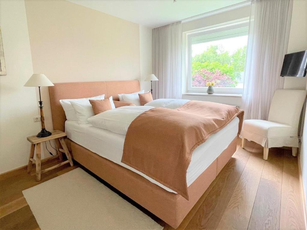 Postel nebo postele na pokoji v ubytování Techts Apartmenthaus