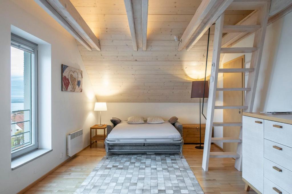 Postel nebo postele na pokoji v ubytování Apartmán se sklípkem