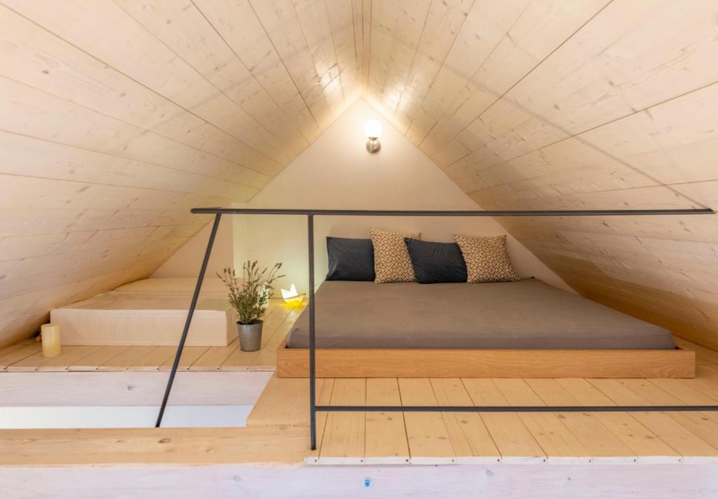 Postel nebo postele na pokoji v ubytování Apartmán se sklípkem