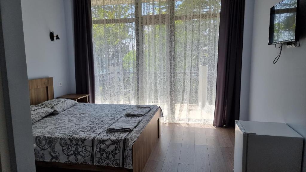 Llit o llits en una habitació de French Hotel