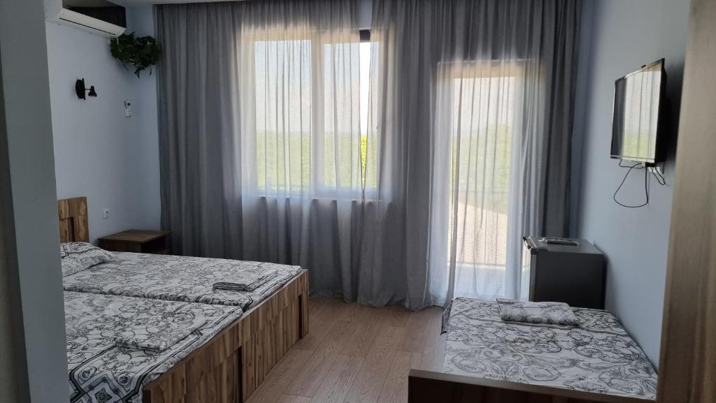Llit o llits en una habitació de French Hotel