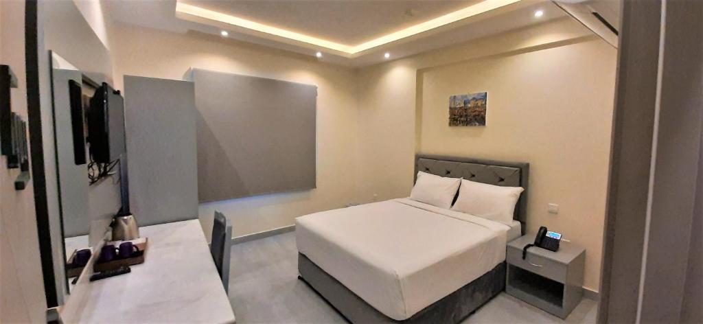 Postel nebo postele na pokoji v ubytování NASEEM HOTEL